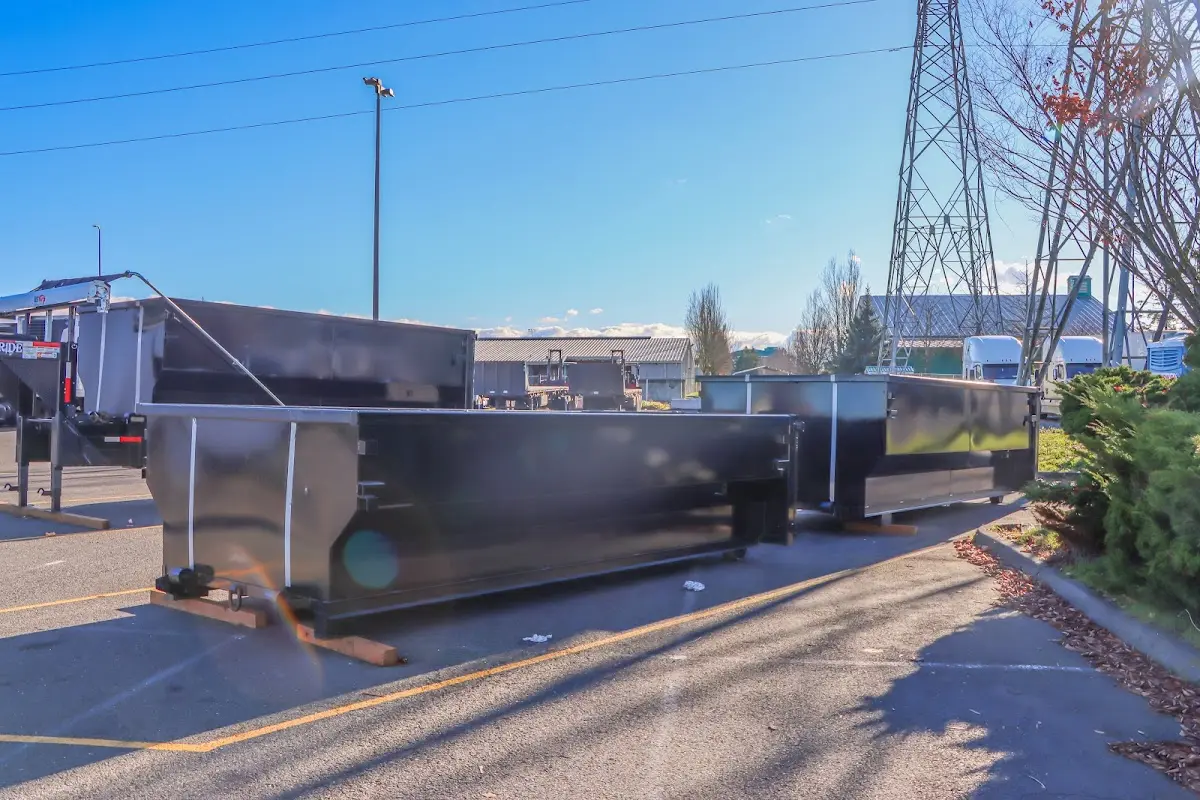 Roll-off dumpster ready for waste disposal at job site for 8 Yard Dumpster Rental in Jackson